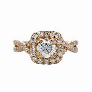 Quality Symbol Sparkling Accent 14 Karat Yellow Gold Twisted Shank Engagement Ring (.84cttw)