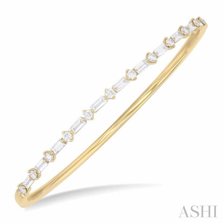 Spiritual Guide 1 1/4 Ctw Baguette and Round Cut Diamond Fashion Bangle in 14K Yellow Gold