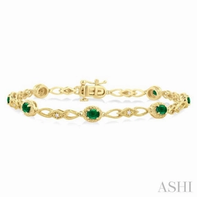 1/20 Ctw Oval Cut 4X3MM Emerald and Round Cut Diamond Precious Fashion Bracelet in 10K Yellow Gold Whole Spectrum Holy Token