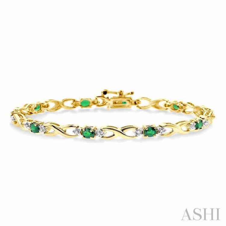 4x3 MM Oval Cut Emerald and 1/10 Ctw Single Cut Diamond Bracelet in 10K Yellow Gold Go-To Item