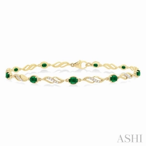 great addition 4X3 MM Oval Cut Emerald and 1/5 Ctw Round Cut Diamond Precious Eternity Link Tennis Bracelet in 10K Yellow Gold