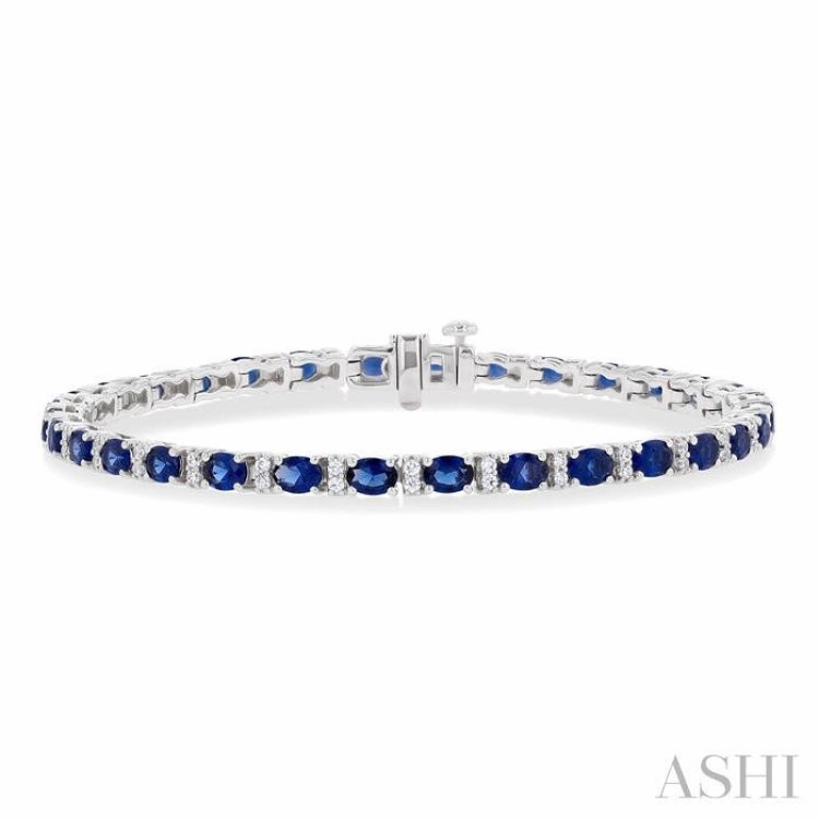 Standard Selection Finest Selection 4X3 MM Oval Cut Sapphire and 1/3 ctw Round Cut Diamond Precious Bracelet in 14K White Gold