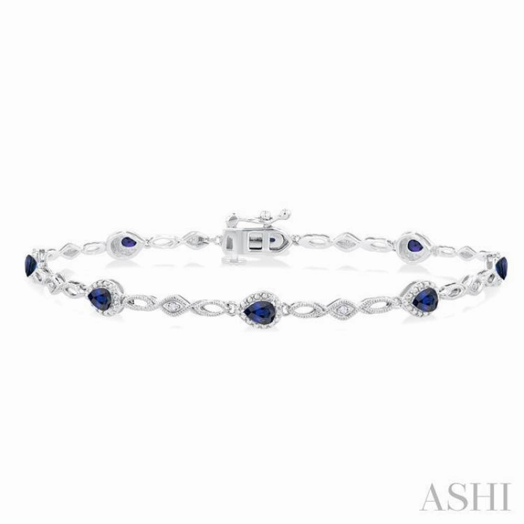 4X3 MM Pear Cut Sapphire and 1/20 Ctw Round Cut Diamond Precious Fashion Bracelet in 10K White Gold Mystical Narrative