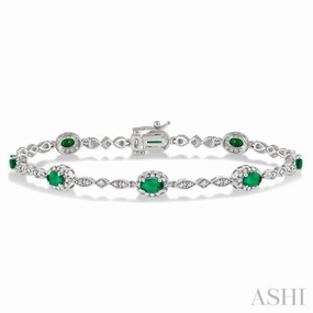 5x3 MM Oval Cut Emerald and 1/20 Ctw Single Cut Diamond Bracelet in 10K White Gold Tailored Touch