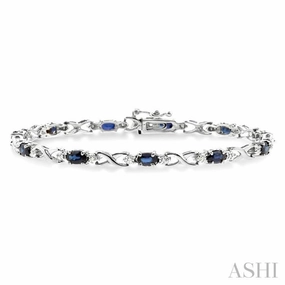Quality Assurance 5x3 MM Oval Cut Sapphire and 1/10 ctw Single Cut Diamond Bracelet in 10K White Gold