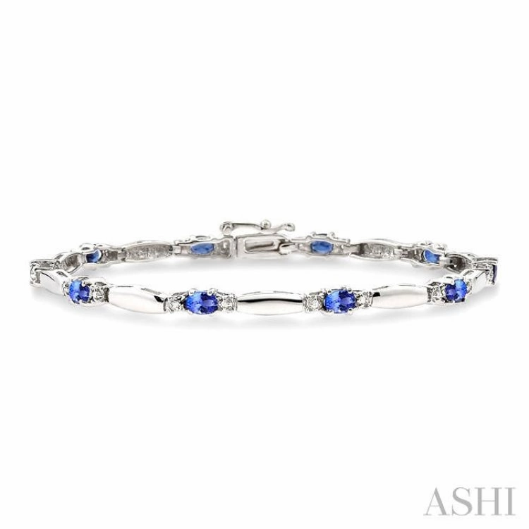 5x3 MM Oval Cut Tanzanite and 1/10 Ctw Bar and Oval Mount Round Cut Diamond Precious Bracelet in 10K White Gold Made With Love Permanent Impact