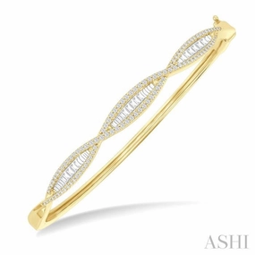 1 Ctw Elongated Twist Pattern Baguette and Round Cut Diamond Fashion Bangle in 14K Yellow Gold Copper Tones
