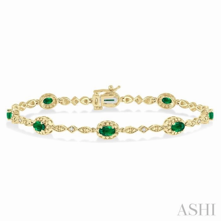 Hometown Pride 5x3 MM Oval Cut Emerald and 1/20 Ctw Single Cut Diamond Bracelet in 10K Yellow Gold