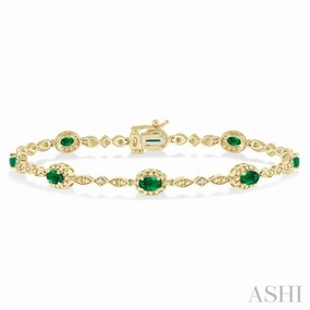 Hometown Pride 5x3 MM Oval Cut Emerald and 1/20 Ctw Single Cut Diamond Bracelet in 10K Yellow Gold