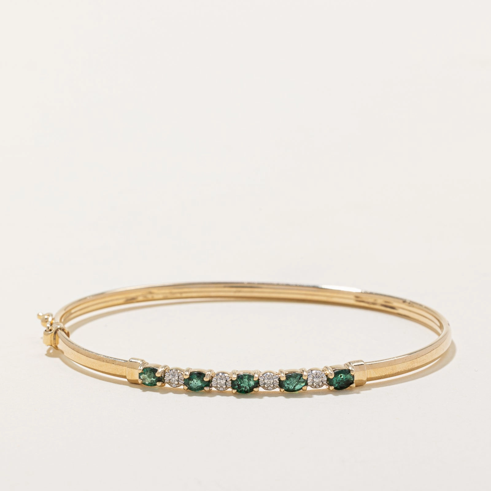 Elegant Flow Emerald & Diamond Bangle | 1.00ctw, 0.015ctw | 7"