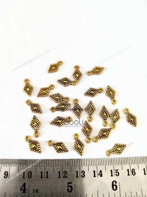 Golden kite shaped rhombus shape Charm dangles CHMG135 10 gm Soft Edge Elegant Finish