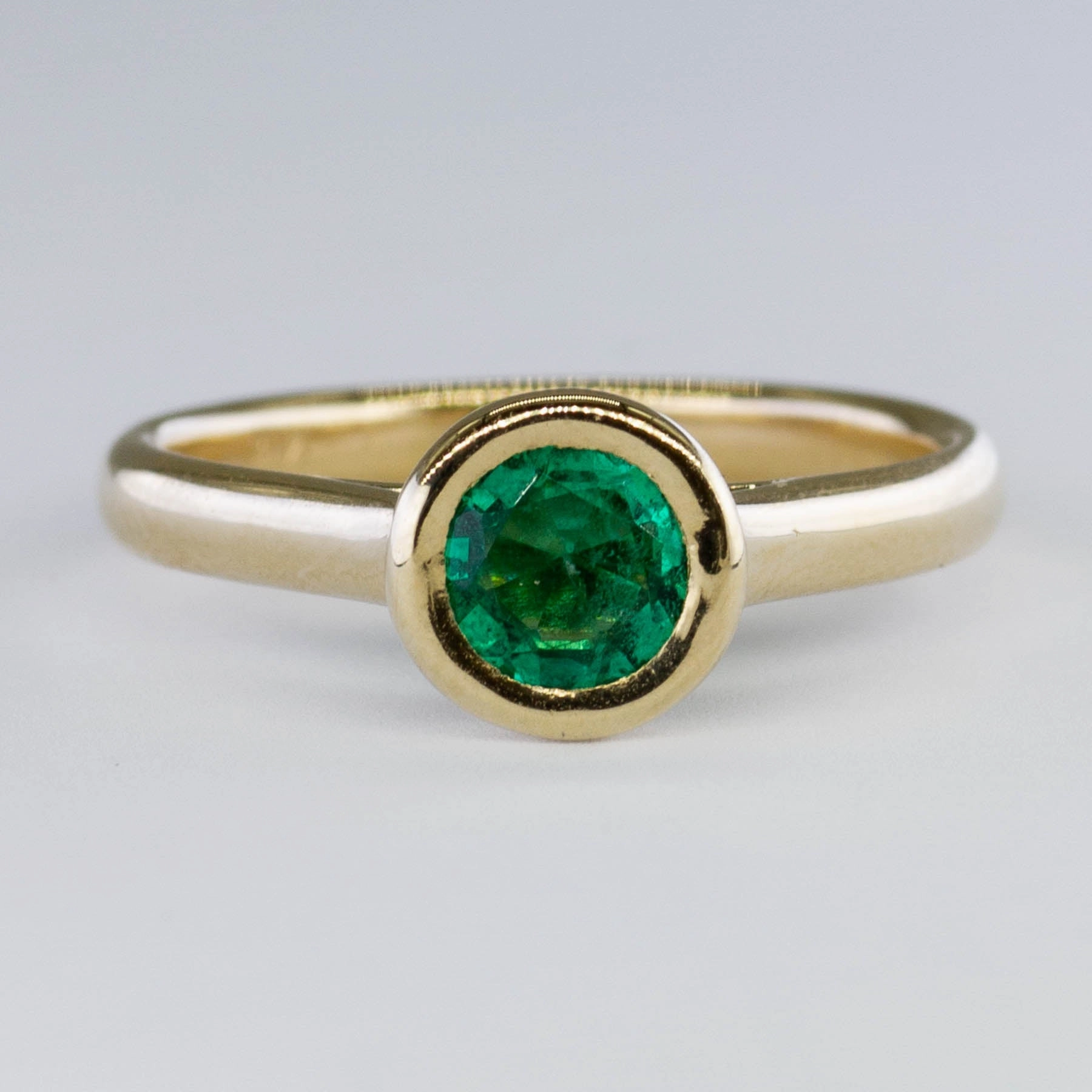 '100 Ways' Bezel Set Emerald Solitaire | 0.56 ct | SZ 6.75 | Gifting Light Golden Tone