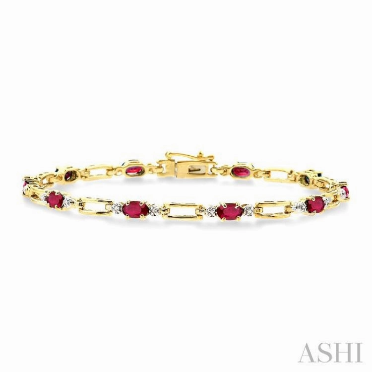 5x3 MM Oval Cut Ruby and 1/10 Ctw Round Cut Diamond Precious Bracelet in 10K Yellow Gold Diverse Appeal Packaged Elegantly