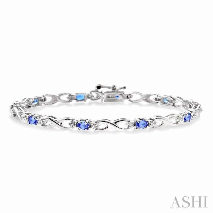 4x3mm Oval Cut Tanzanite and 1/10 Ctw Single Cut Diamond Bracelet in 10K White Gold Easy Journey