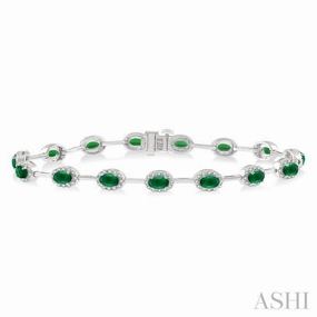 Memorable Trip 5x3 MM Oval Cut Emerald and 5/8 Ctw Round Cut Diamond Precious Bracelet in 14K White Gold
