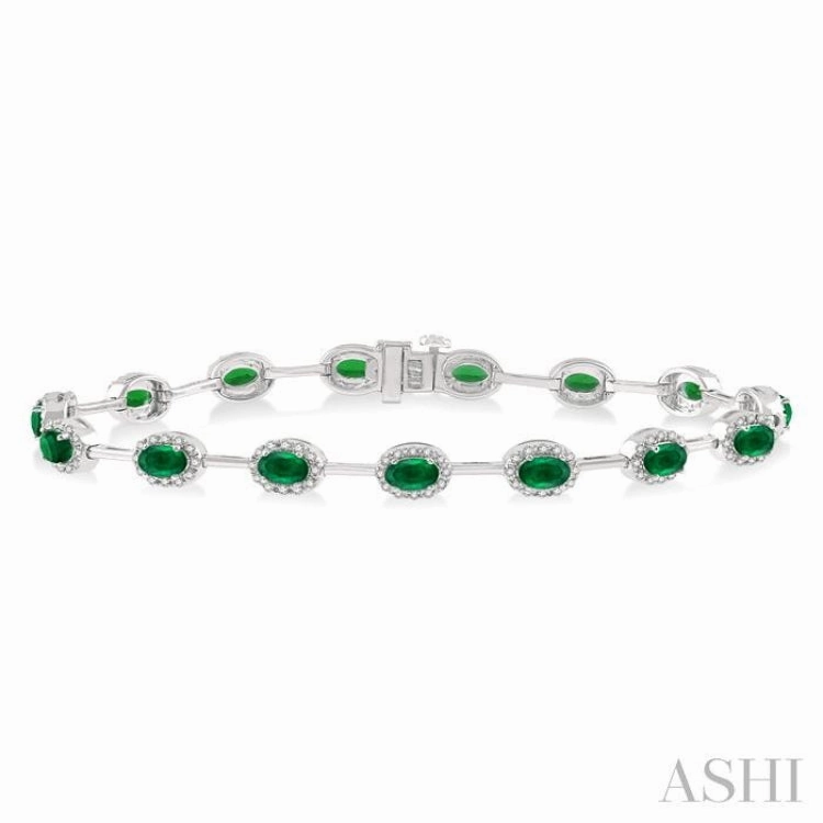 Memorable Trip 5x3 MM Oval Cut Emerald and 5/8 Ctw Round Cut Diamond Precious Bracelet in 14K White Gold