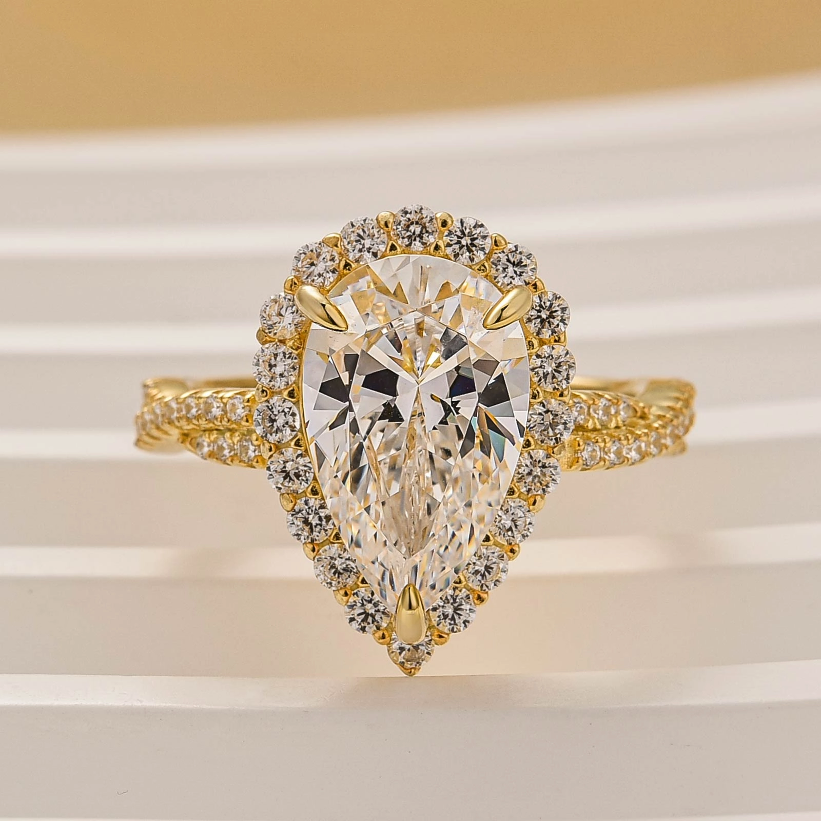 Glamorous Appeal Subtle Sparkle 4.0Ct Pear Cut Twist Halo Engagement Ring In Sterling Silver