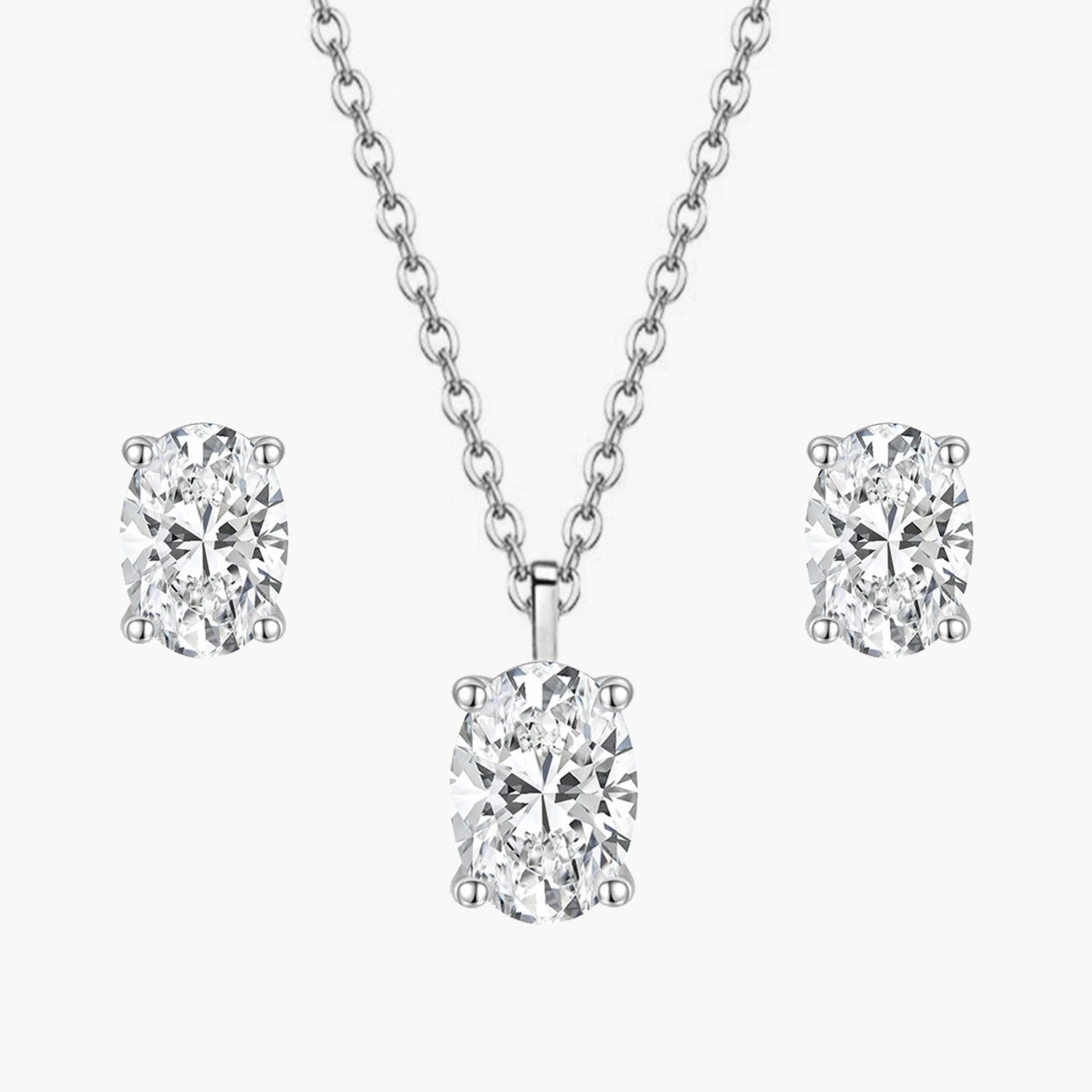 Creative Detail Oval Cut CZ Pendant Necklace Set in Sterling Silver