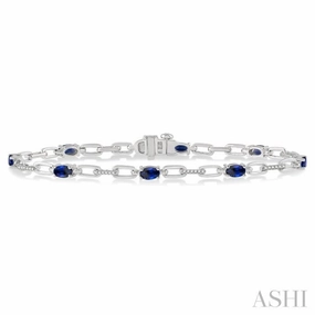 5x3 MM Oval Cut Sapphire and 1/6 Ctw Round Cut Diamond Precious Bracelet in 10K White Gold Unfettered Imagination Uplifting Bond