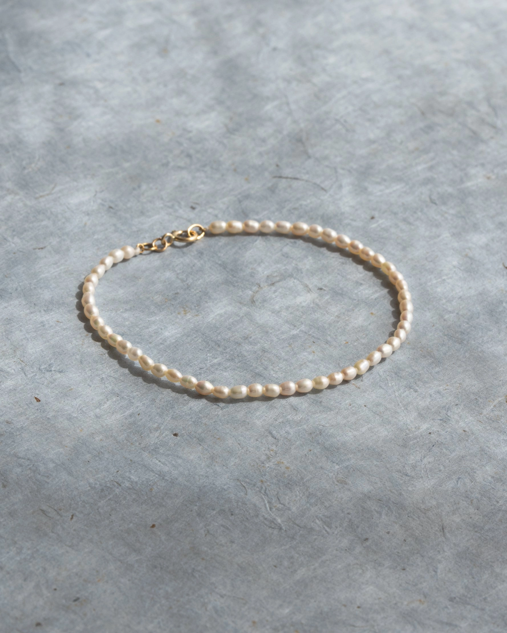 Mini Pearl Strand Bracelet Noteworthy Accent