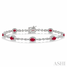 Exclusive preview 5x3 MM Oval Cut Ruby and 1/20 Ctw Single Cut Diamond Bracelet in 10K White Gold