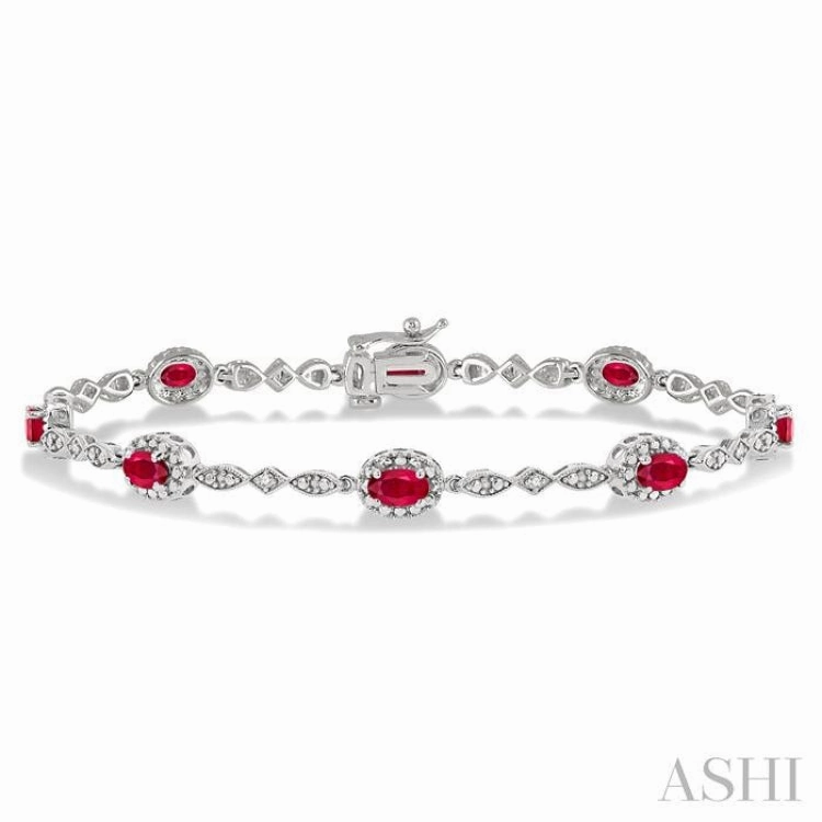 Exclusive preview 5x3 MM Oval Cut Ruby and 1/20 Ctw Single Cut Diamond Bracelet in 10K White Gold