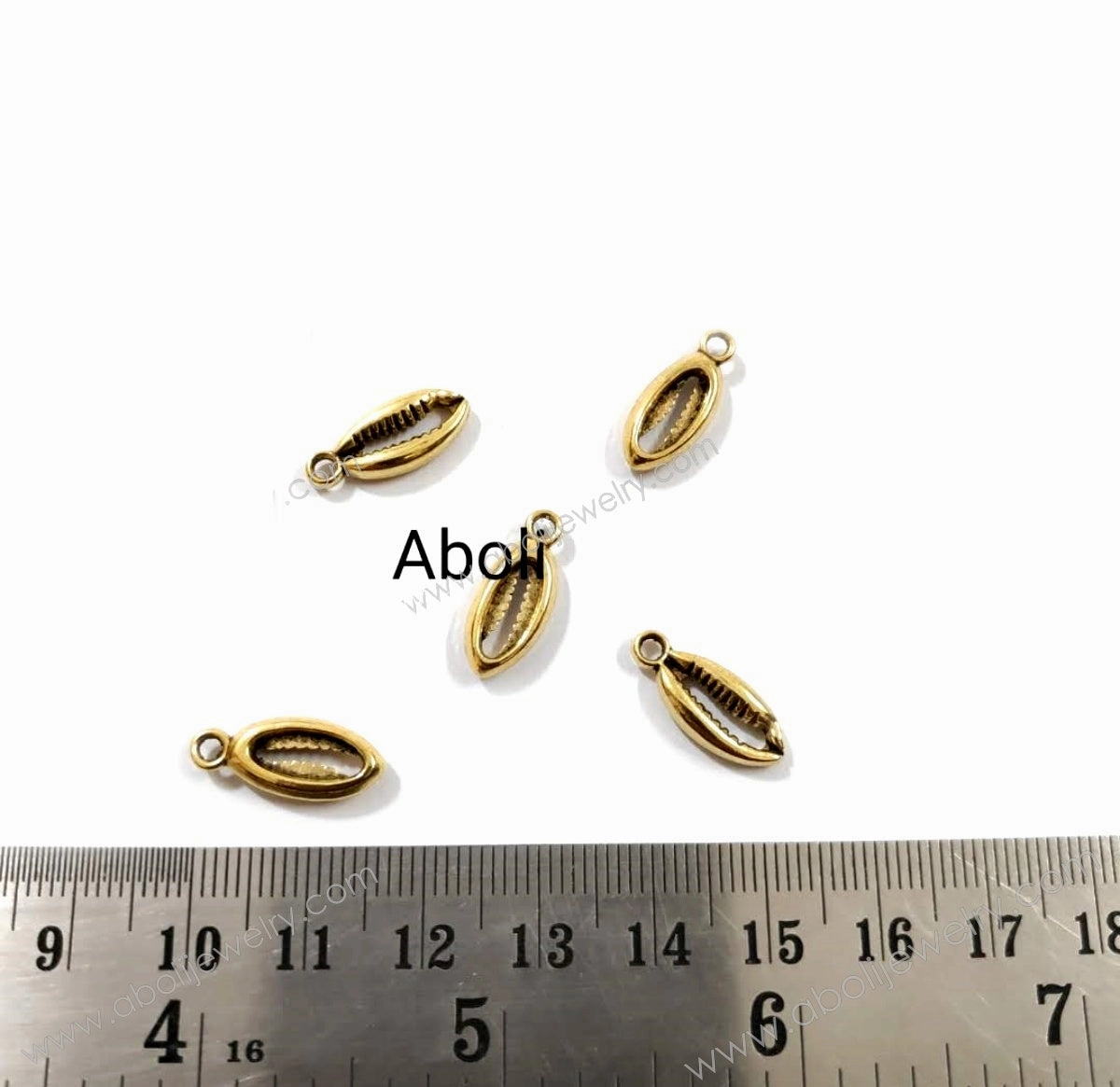 Golden cowrie Charm sea shell charm beach, ocean, sea, shells kowri kawdi CHMG61 5 charms Trendy Appeal