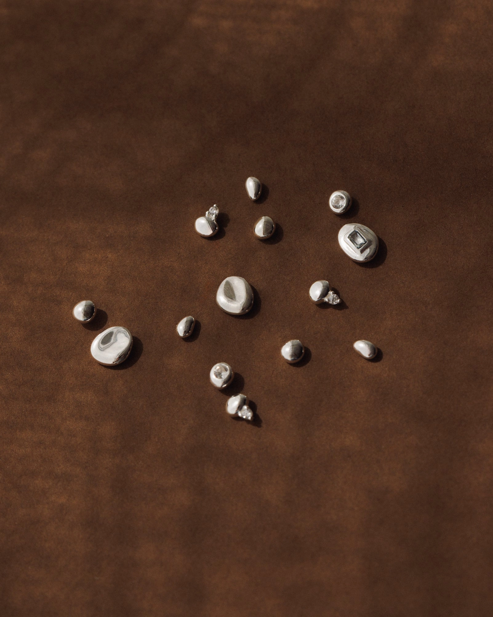 Gleaming Pebble Studs Handsome Accent Pretty Finish