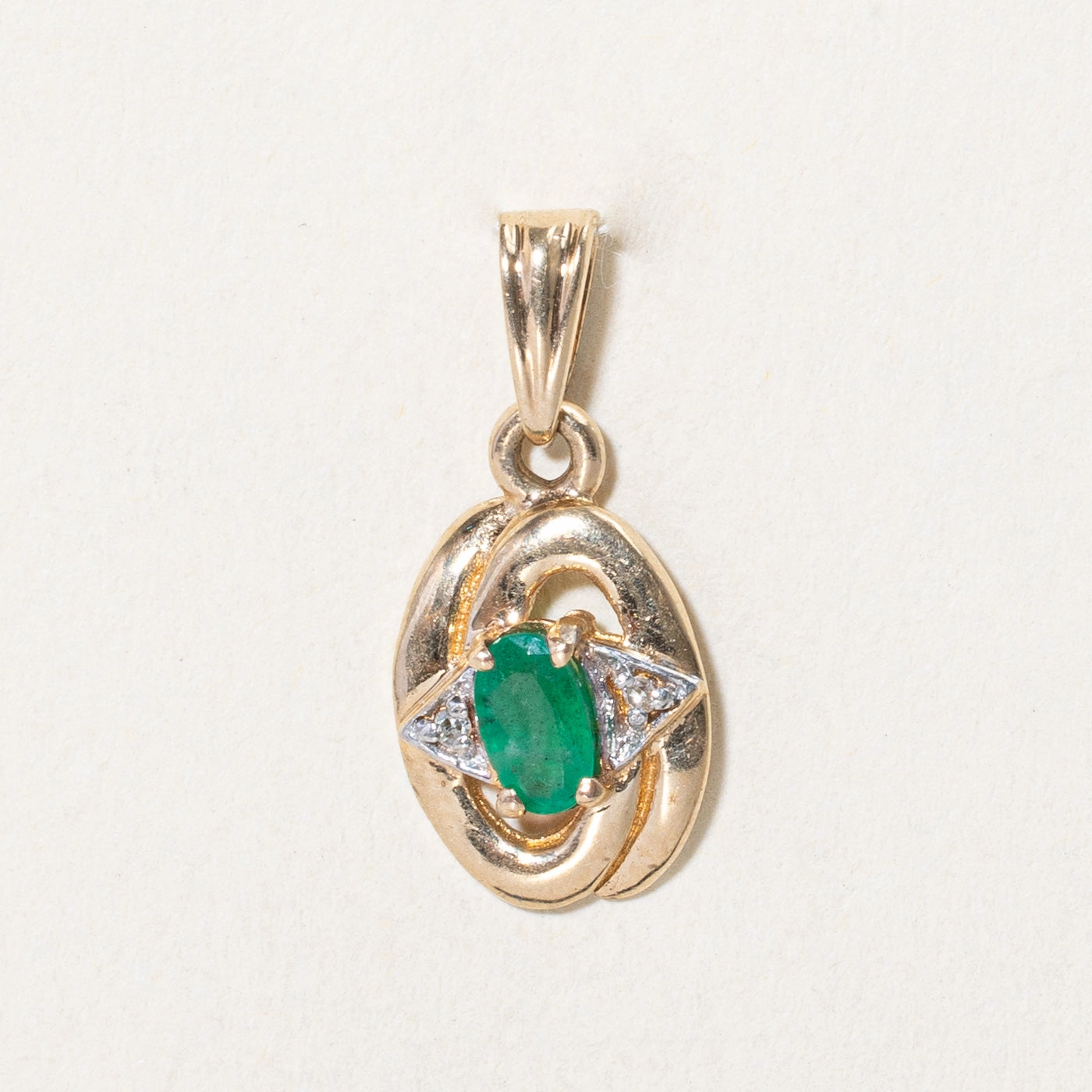 Soft Spark Oval Cut Emerald & Diamond Pendant | 0.20ct, 0.01ctw |