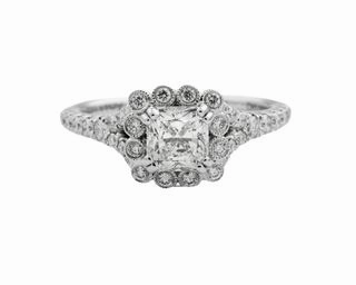 Polished Finish RADIANT CUT DIAMOND RING WITH DIAMONDS THROUGHOUT THE BEZEL AND SPLIT SHANK