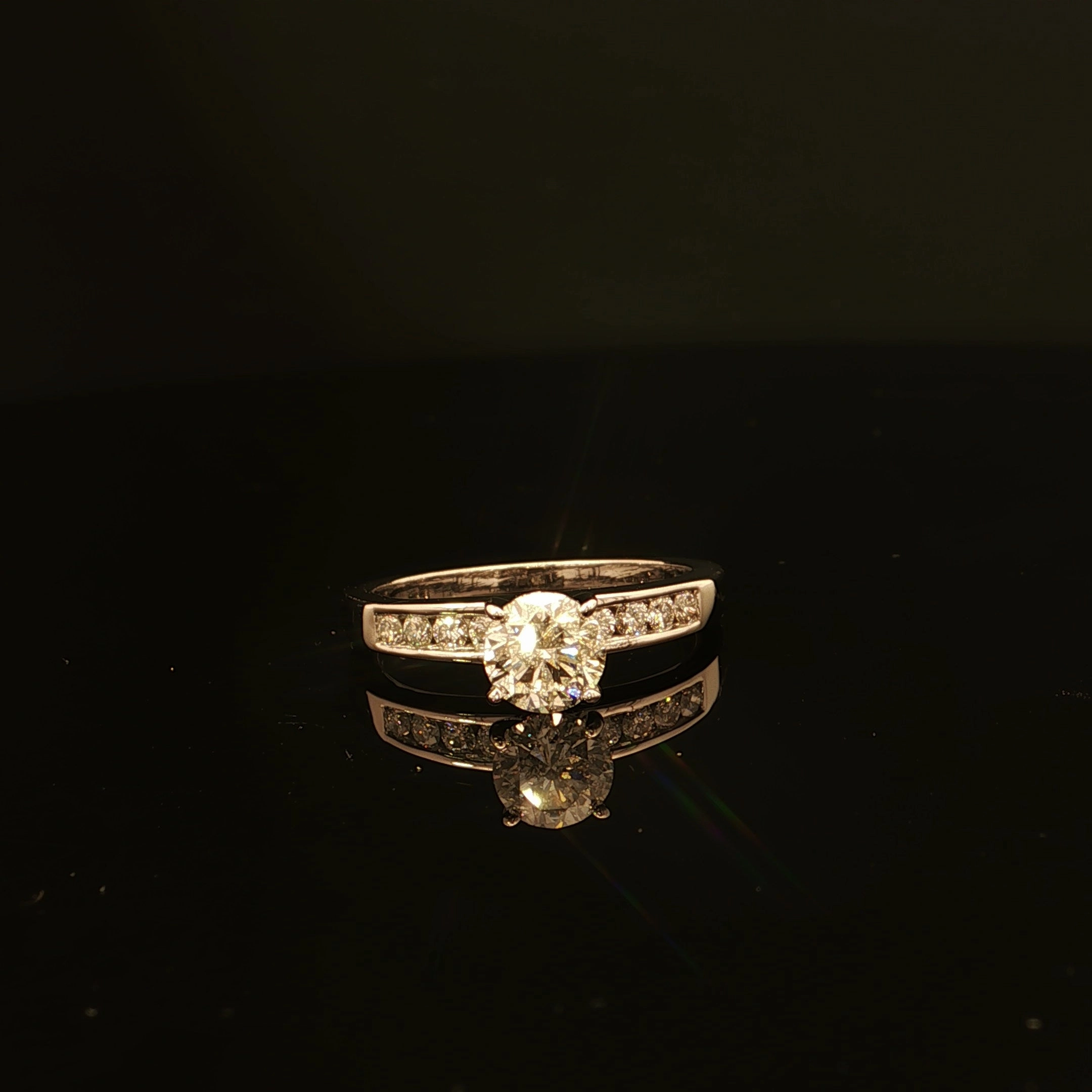 Unique Mark Attractive Appearance Estate 18K White Gold 1.08cttw with .83ct G/I1 Center Channel Set Round Diamond Engagement Ring