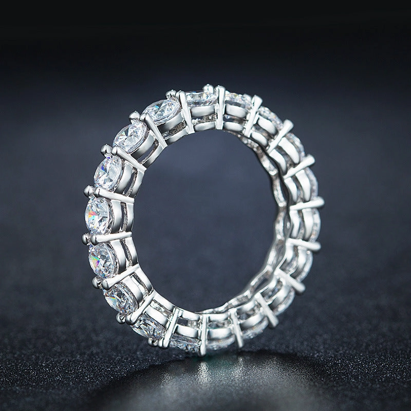 Dazzling Edge Smooth Surface Rhodium Plated Sterling Silver Ring 4mm CZ Eternity Band Ring in Airline Setting