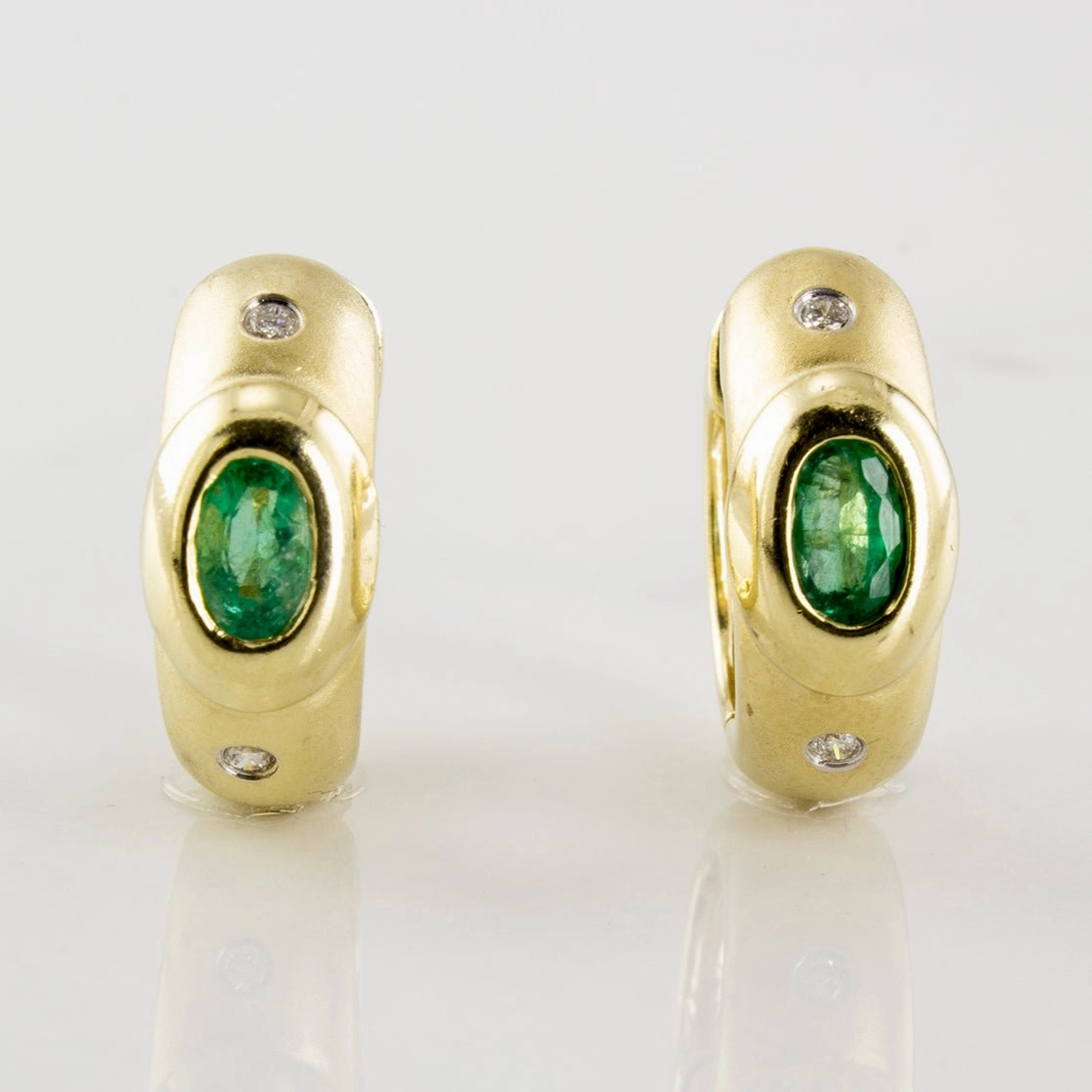 'Birks' Oval Emerald & Diamond Accent Hoop Earrings | 0.04ctw, 0.46ctw | Modern Sparkle