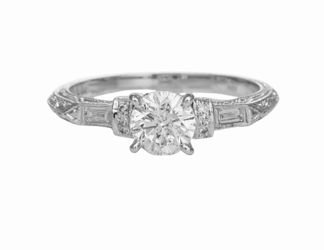 Celebrity Style Elegant adornment 18 Karat White Gold Engraved Antique Engagement Ring (.79cttw)