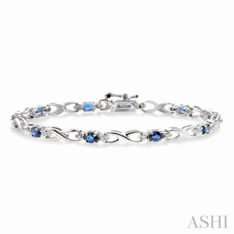 4x3 MM Oval Cut Sapphire and 1/10 Ctw Single Cut Diamond Bracelet in 10K White Gold Elegant feature