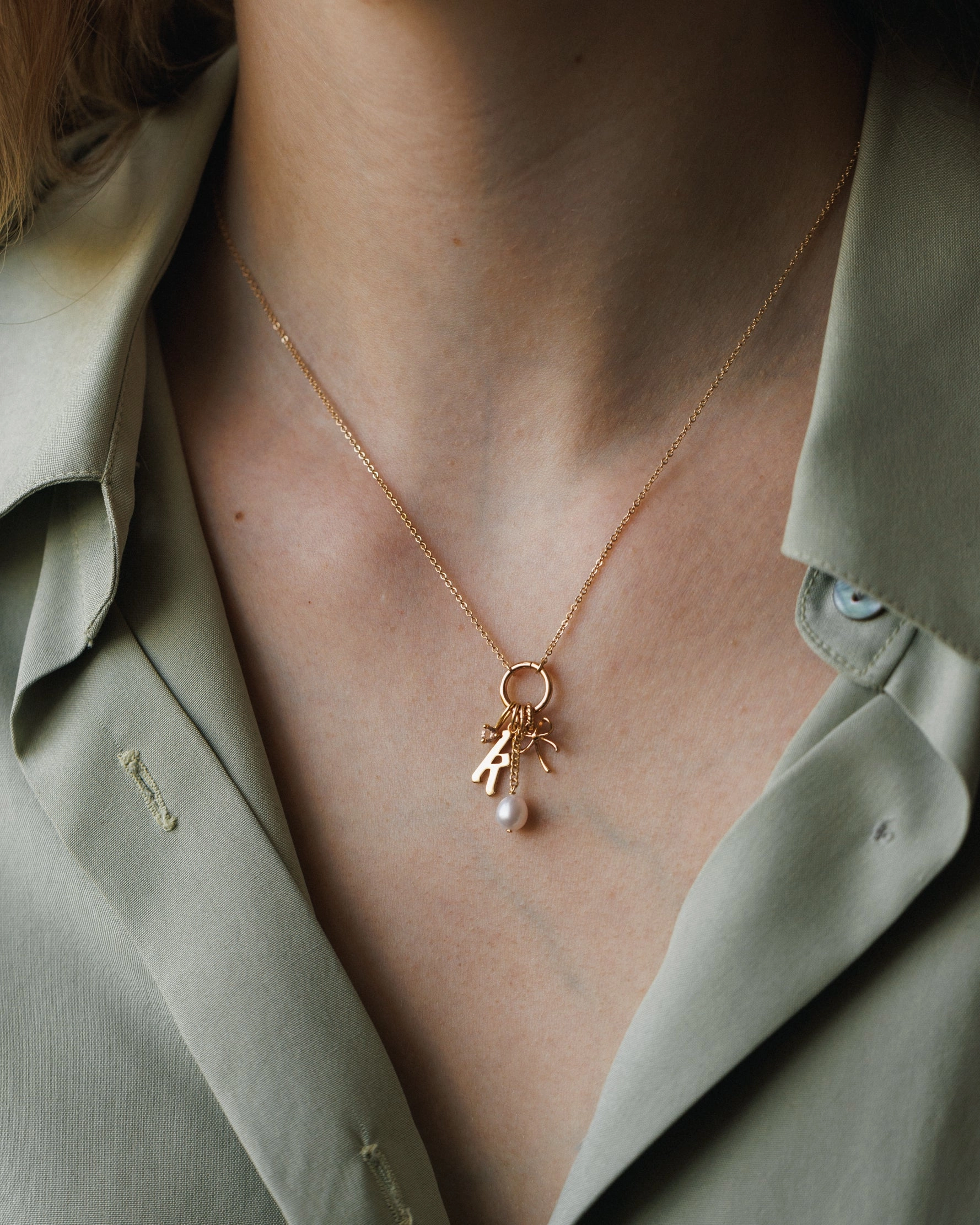 Suspended Pearl Charm Glamour Appeal