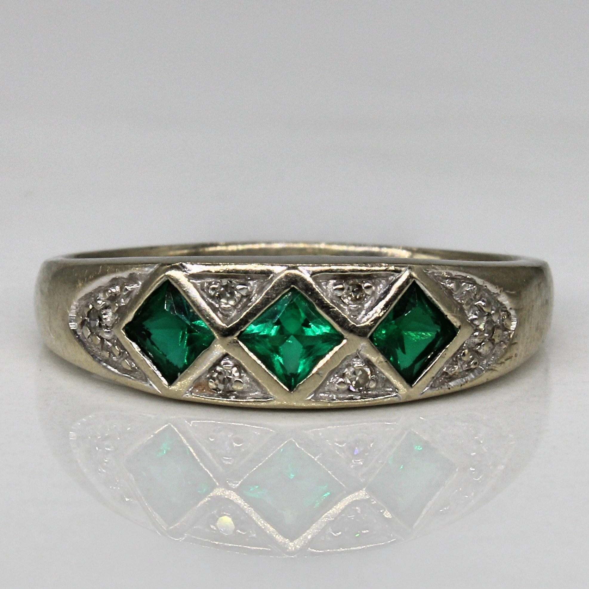 Trendy Fashion Fine Accent Synthetic Emerald & Diamond Ring | 0.30ctw, 0.03ctw | SZ 8.5 |