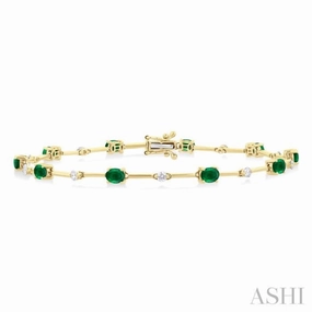 Now Showing 4x3 MM Oval Cut Emerald and 1/3 ctw Round Cut Diamond Precious Bar Bracelet in 10K Yellow Gold