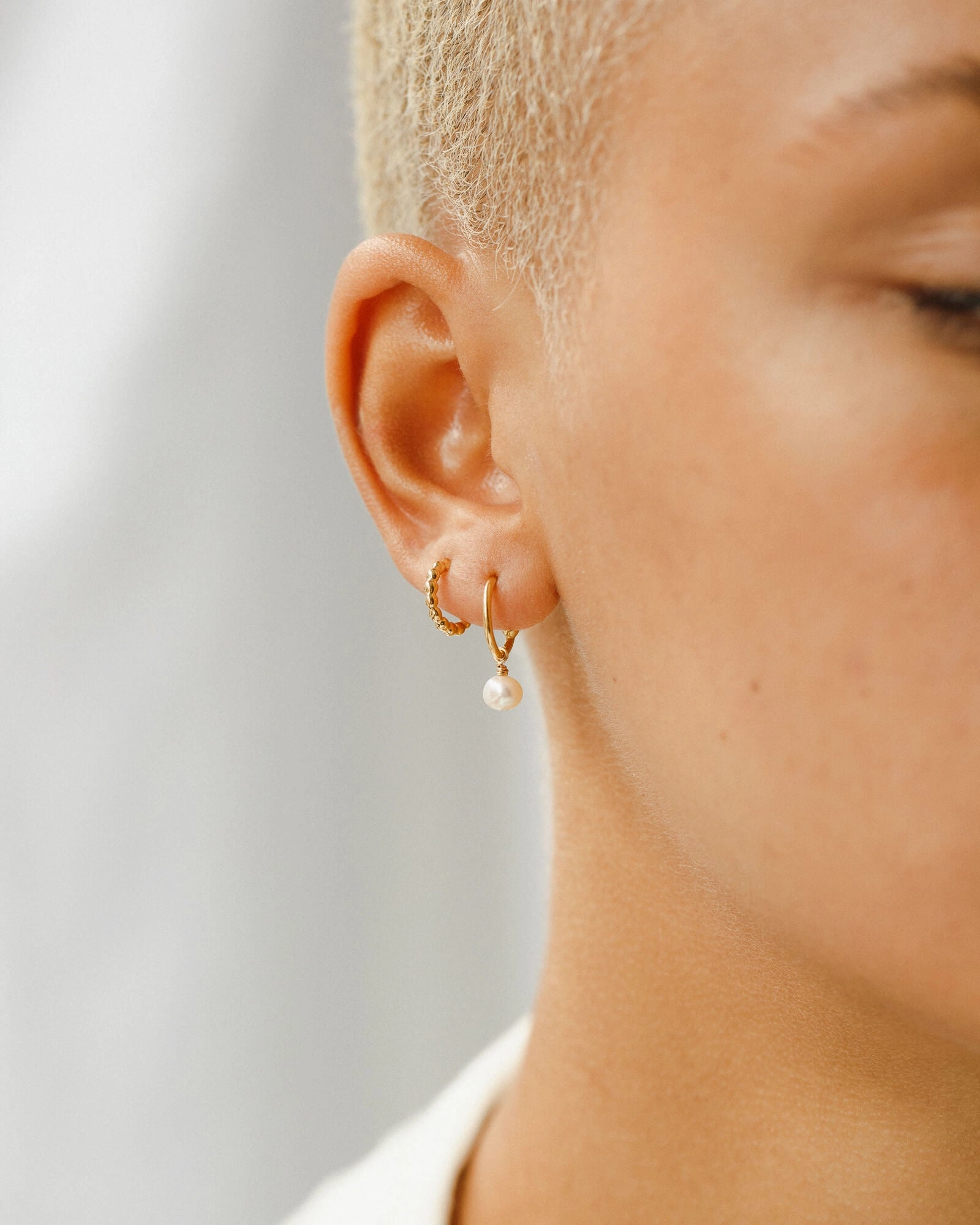 Sia Pearl Huggie Hoops Radiant Accent Round Accessory