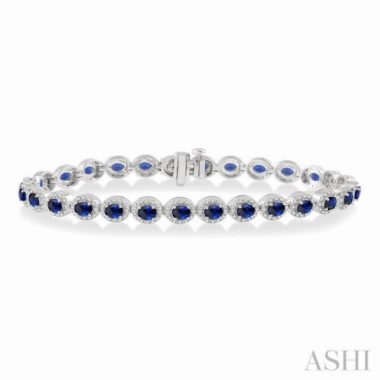Harmonious Perspective 4x3 MM Oval Cut Sapphire and 1 ctw Round Cut Diamond Precious Bracelet in 14K White Gold