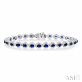 Harmonious Perspective 4x3 MM Oval Cut Sapphire and 1 ctw Round Cut Diamond Precious Bracelet in 14K White Gold