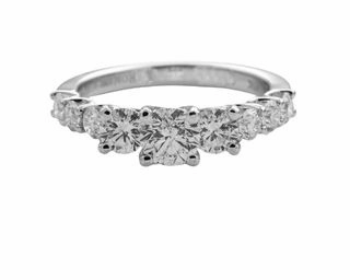 Creative Decoration THREE STONE DIAMOND RING WITH DIAMONDS DOWN THE SHANK