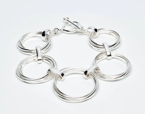 Graduated Interlinked Circle Sterling Silver Bracelet Comprehensive Mixes